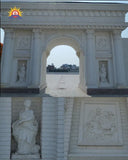 White FRP arch with statue niche and relief detail
