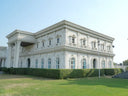 White neoclassical FRP building facade with lawn