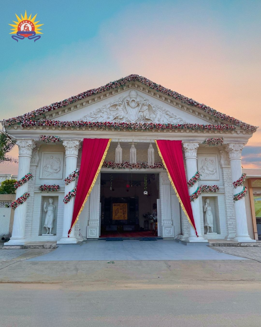 Pediment entrance portico with columns and red drapes