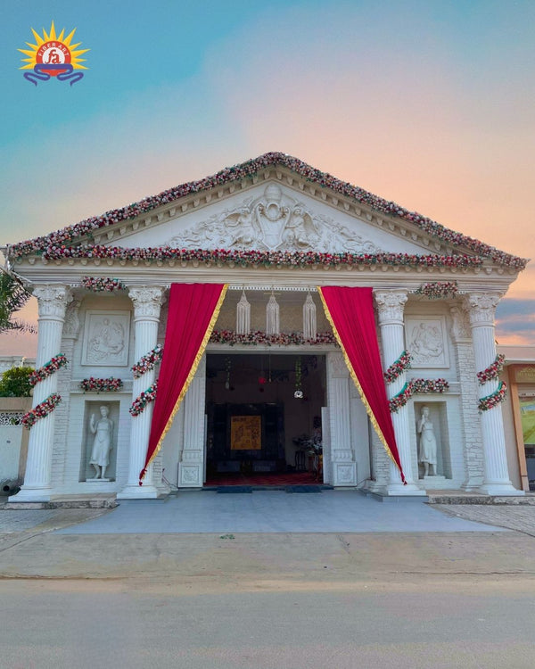 Pediment entrance portico with columns and red drapes
