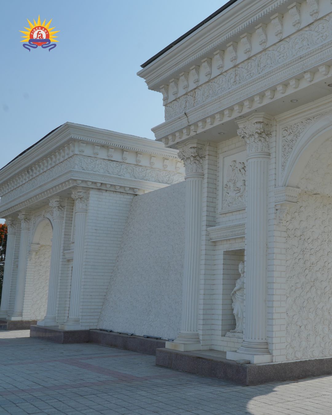 White classical facade with carved columns for a wedding venue